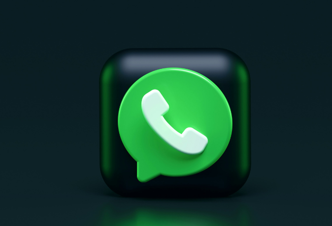 Rwandan entrepreneur using WhatsApp Business to chat with customers, manage orders, and build relationships.