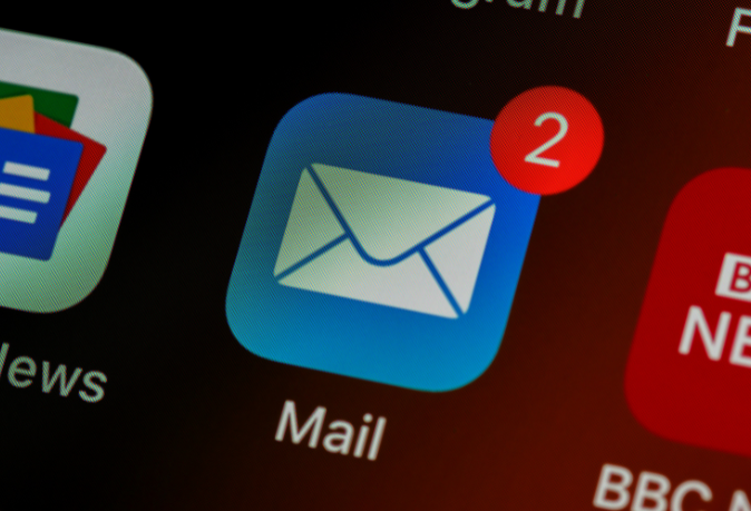 Rwandan entrepreneur creating an email list for business promotions and customer engagement.
